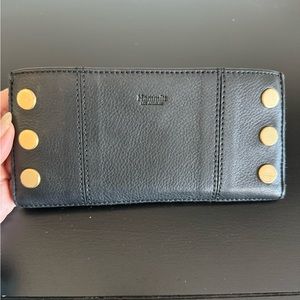 Hammitt 110 North wallet. Black/brushed gold. Red lining